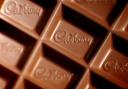 Mondelez has urged stores to remove certain boxes of Cadbury Milk Tray because of taste concerns