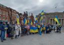 Members of Salisbury's Ukrainian community in front of the 'I Want to Live' sculpture in Guildhall Square. (Photo by Joshua Truksa)