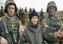 Stacey Dooley with Ukrainian recruits Mykola (left) and Artem (right) (Image: BBC/True Vision East/Blanca Munoz)