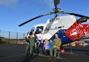Children from Aerheart Class posing with Squadron Leaders Garry McKary and Liam Glasby