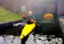 'They haven't even put a sign out' Man rows canoe through flooded underpass