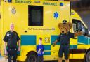 Ewan McNeil (centre) with his grandad, Roland Revell (left), and the new South Western Ambulance Service mascot, Roly Bear.