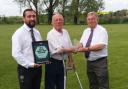 Club chairman Mike Plowman receives the Charter Standard award from  Greg Coulton and Richard Gardner from Wiltshire FA