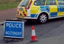 Woman taken to hospital after crash involving car and two HGVs