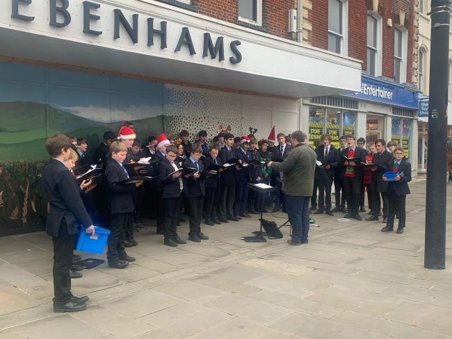 Bishop Wordsworth's School choir entertains shoppers with Christmas carols
