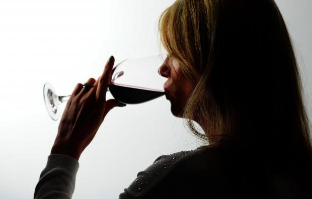 Salisbury Journal: A woman drinking red wine. Credit: PA
