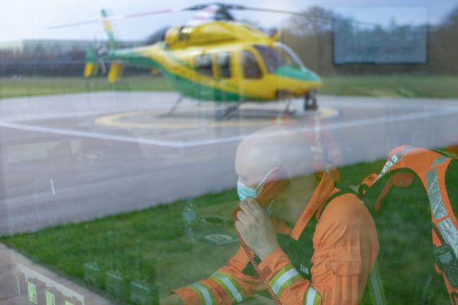 Wiltshire Air Ambulance’s Bell 429 helicopter on the helipad, with critical care paramedic Dan Tucker inside the crew room