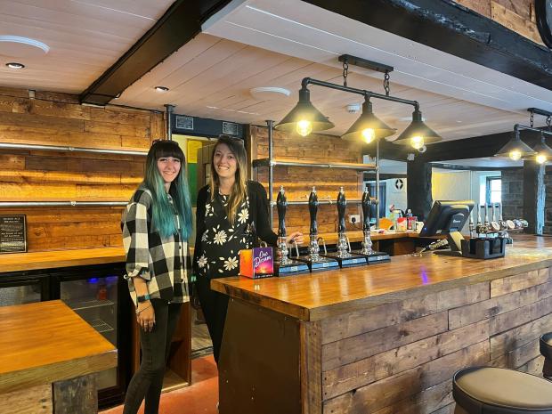 Salisbury Journal: The New Inn Landlord Hannah Burden and assistant manager Iona Lloyd - behind the new bar!