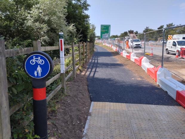 Salisbury Journal: Resurfacing work on path between West Street and the Verwood junction by the A31 at Ringwood. Picture: National Highways