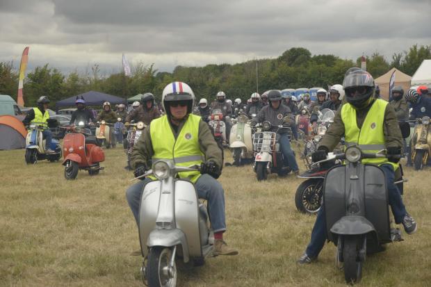 More than 80 scooter riders take part in the ride out.                   Photo: Trevor Porter.