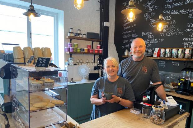 Karen and Mark Johnson in their new coffee shop, the Black Dog Coffee Co.