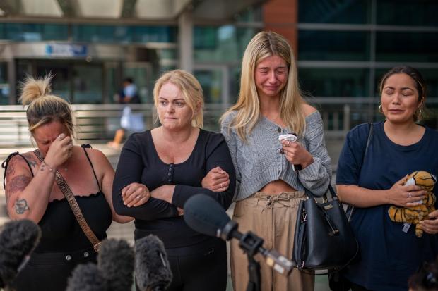 Salisbury Journal: Hollie Dance (second left) surrounded by family and friends, outside the Royal London hospital in Whitechapel, east London