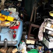 A classic MG A Roadster was found under a pile of rubbish during a house clearance in Dorset