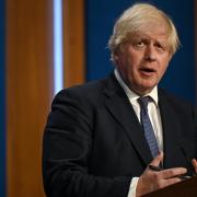 PA Explore. Boris Johnson during a media briefing in Downing Street on Covid-19 in July