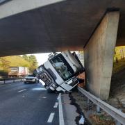 A lorry struck a bridge and overturned on the A31 today.