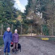 Graham and Lindy Paramor in front of the lime yard site. They are two of a group of West Grimstead residents opposed to the application.