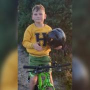 Eight-year-old Mason George, who will be cycling 50 miles for Ukraine.
