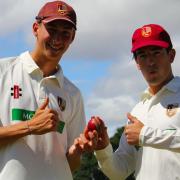 Josh Croom and Tom Lewis pictured with the match ball after each taking five wickets for South Wilts (Picture: Roy Honeybone)