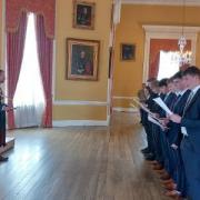 The recruits give the Oath of Allegiance in front of the Mayor