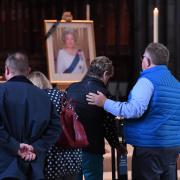 People mourning The Queen in Salisbury Cathedral by Russell Sach