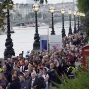 Members of the public queue on the South Bank in London, as they wait to view Queen Elizabeth II lying in state. Picture: Victoria Jones/PA Wire