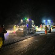 The damaged A337 road and pavements being repaired by Hampshire Highways