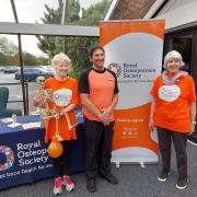 A stand promoting the new risk checker at David Lloyd Gym in Salisbury. Jan is pictured with deputy manager Ian Bishop and Elizabeth Andrews, the chair of a support group in Salisbury