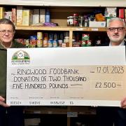 Ringwood Foodbank accepting a £2,500 donation from Pennyfarthing Homes. (Photo by Pennyfarthing Homes)