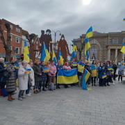 Members of Salisbury's Ukrainian community in front of the 'I Want to Live' sculpture in Guildhall Square. (Photo by Joshua Truksa)