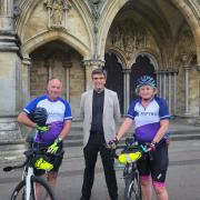 Paul and Karen Smith with Dean of Salisbury, Reverend Nick Papadopulos, at Salisbury Cathedral before heading off to Upton Scudamore on Thursday, August 17.