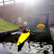 'They haven't even put a sign out' Man rows canoe through flooded underpass