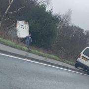 A31 reopens after van rolls over and crashes in ditch