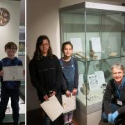 Left: Runners up Anna, Lily, and Callum and right: Museum director Adrian Green and the winners with their curated display.
