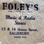A logo for Foley's Music and Radio Stores.