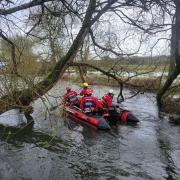 Search and rescue teams in the River Avon by Churchill Gardens