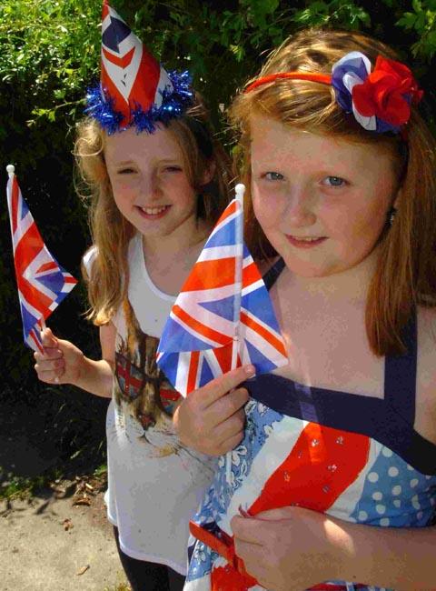 Two patriotic pupils at Wilton and Barford Primary School flying the flag for the Jubilee. DC1559P2