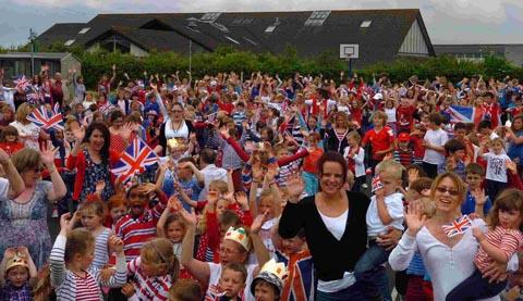 St Mark's Junior School, Wyndham Park Infant School and Exeter House School joined forces for a big Jubilee celebration. DC1628P23