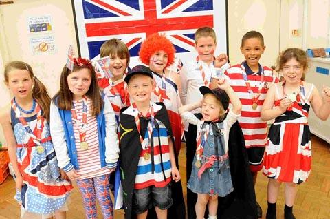 Children and staff at Woodlands Primary School celebrate the Jubilee. DC1617P10