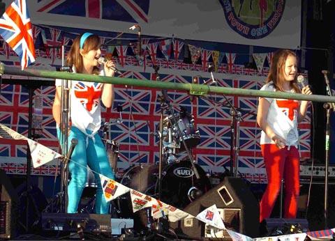 Amesbury's Got Talent joint winners Katie Gambold and Amelia Blandford perform at the Amesbury Jubilee Concert in Bonnymead Park. DC1657P19