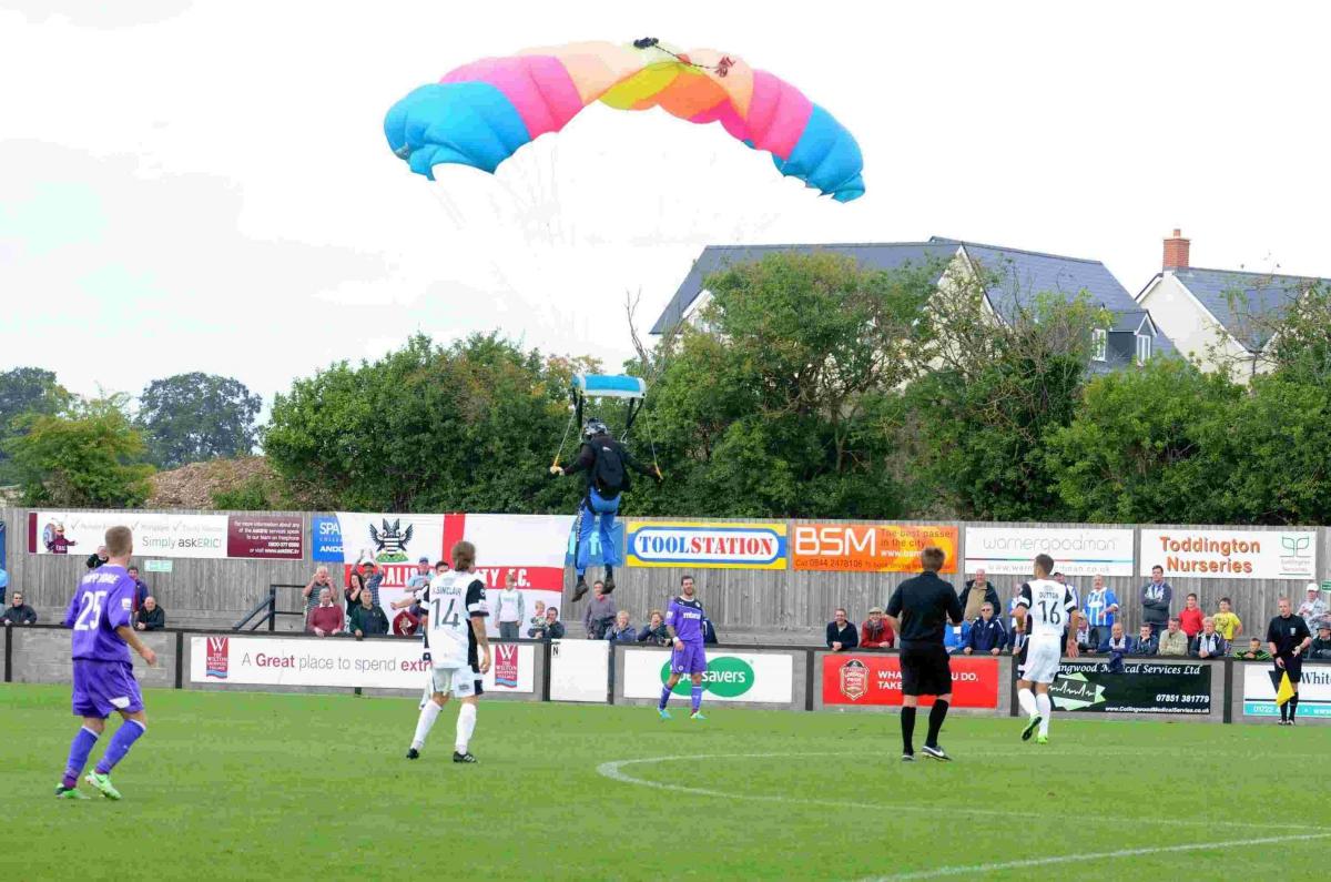 Parachutist lands on pitch at Ray Mac