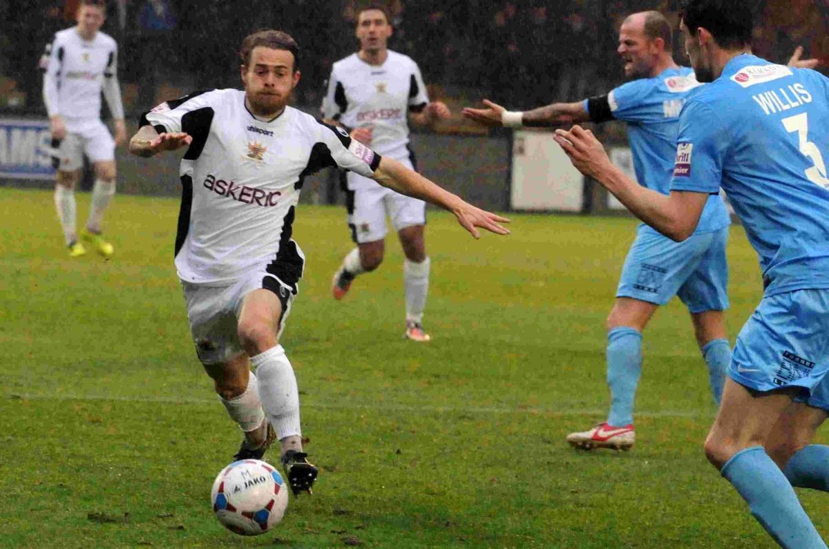 Salisbury battle through the torrential conditions at home to Southport