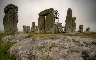 A scaffold is erected inside the stone circle as specialist contractors at Stonehenge recently. Credit:PA