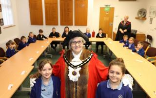 The Mayor of Verwood, Cllr Toni Coombs, with (right) Jasper Nash, chairperson of the school parliament, and Seinna Mills, Deputy Prime Minister.
