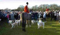 Huntsmen Michael Woodhouse and the New Forest Hounds at the Boxing Day meet at the Balmer Lawn Hotel