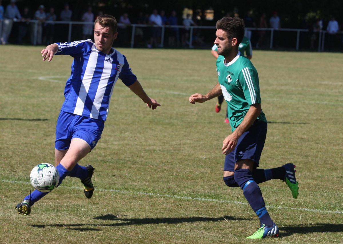Patrick Nolan tussles for the ball in Salisbury's 0-0 draw with Brockenhurst