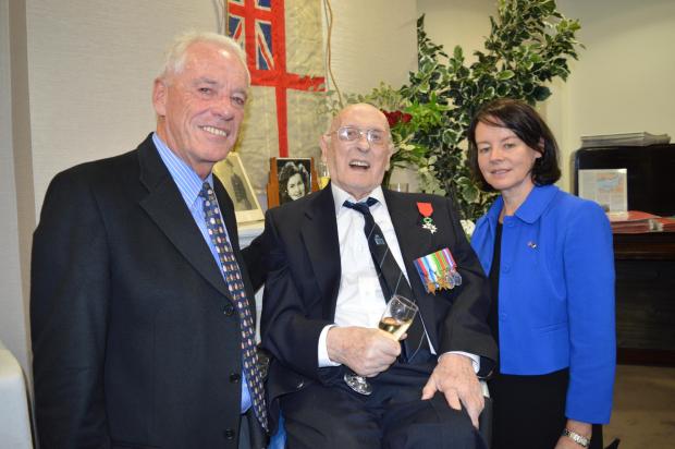 Salisbury Journal: Alan Richardson with Josette Lebrat, the French honourary consul, and David Hogg the son of Donald Hogg who was Alan's commanding officer